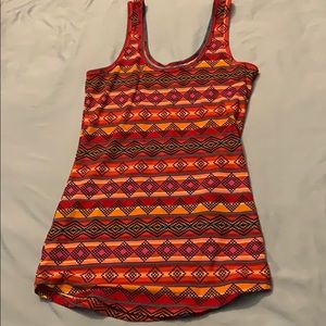 A never worn colorful tank top.
